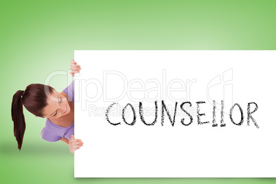Pretty brunette showing card with counsellor
