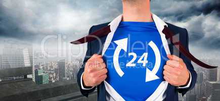 Composite image of businessman opening his shirt superhero style