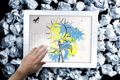 Composite image of hand presenting on tablet