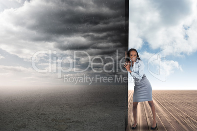 Composite image of businesswoman pushing away scene