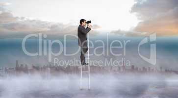 Composite image of businessman standing on ladder