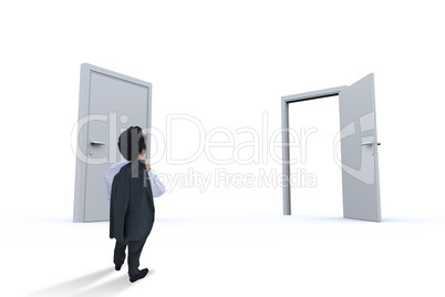 Composite image of businessman standing