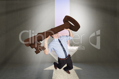 Composite image of businessman carrying large key