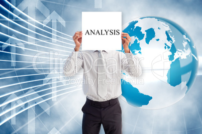 Businessman holding card saying analysis