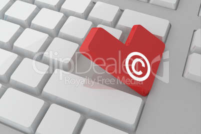Composite image of copyright symbol on key
