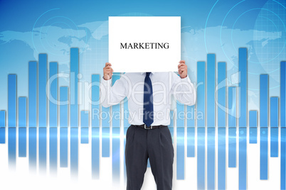 Businessman showing card with the word marketing