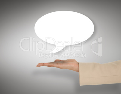 Composite image of female hand presenting speech bubble