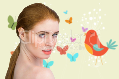 Composite image of beautiful redhead looking at camera