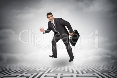 Composite image of cheerful businessman in a hurry