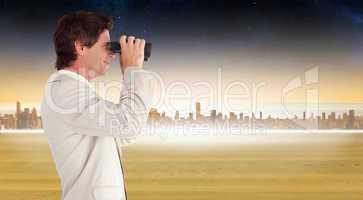 Composite image of businessman using binoculars