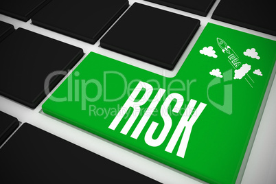 Risk on black keyboard with green key