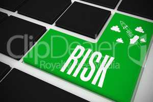 Risk on black keyboard with green key