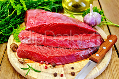 Meat beef on board with herbs and spices