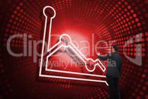 Composite image of graph and businessman pointing