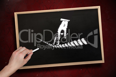 Composite image of hand drawing fingers on tightrope with chalk