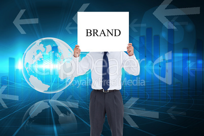 Businessman holding card saying brand