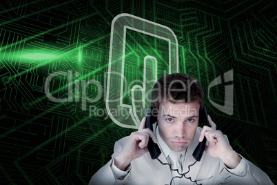 Composite image of tablet pc and businessman tangled in wires