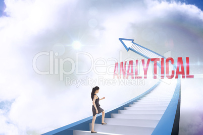 Analytical against red staircase arrow pointing up against sky