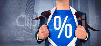 Composite image of businessman opening his shirt superhero style