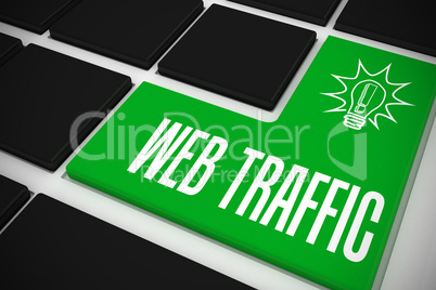 Web traffic on black keyboard with green key