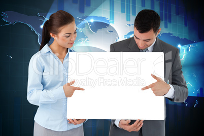 Composite image of business partners showing card