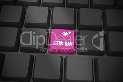 Dream team on black keyboard with purple key