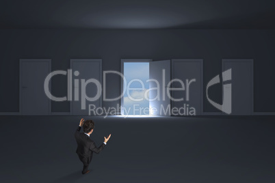 Composite image of gesturing businessman