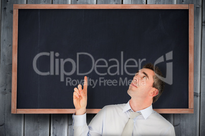 Composite image of business manager pointing