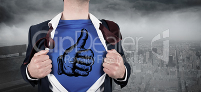 Composite image of businessman opening his shirt superhero style