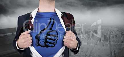 Composite image of businessman opening his shirt superhero style