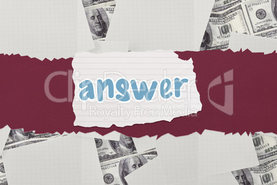 Answer against white paper strewn over dollar bills