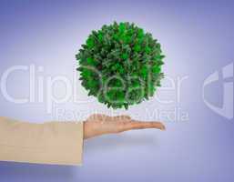 Composite image of female hand presenting green sphere