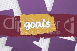 Goals against purple paper strewn over notepad