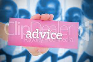 Woman holding pink card saying advice