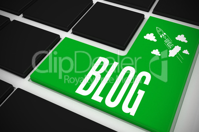 Blog on black keyboard with green key