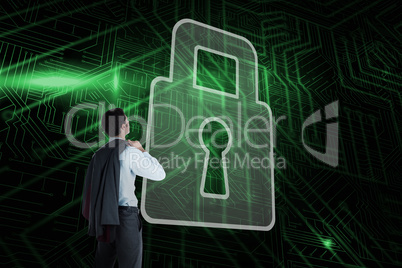 Composite image of lock and businessman looking