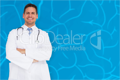 Composite image of handsome doctor with arms crossed