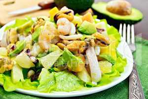 Salad seafood and avocado on napkin