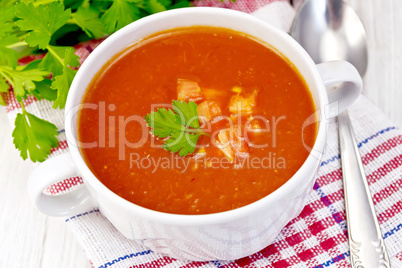 Soup tomato with pieces on the light board