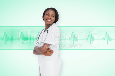 Composite image of young nurse with arms crossed