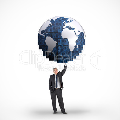 Composite image of businessman holding blue earth