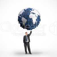 Composite image of businessman holding blue earth