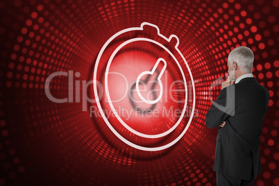 Composite image of stopwatch and businessman looking