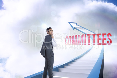 Committees against red staircase arrow pointing up against sky