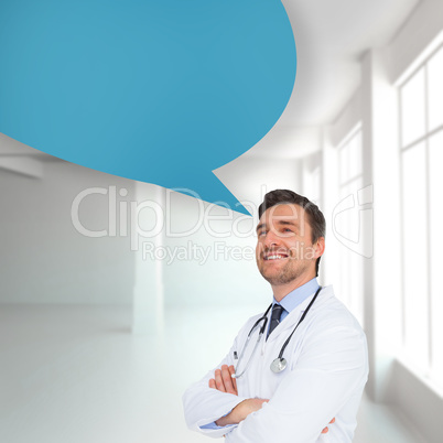Composite image of handsome young doctor with arms crossed with Composite image of handsome young doctor with arms crossed with