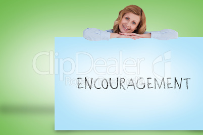 Businesswoman showing card with encouragement