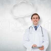 Composite image of young doctor using tablet pc with thought bub