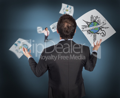 Composite image of gesturing businessman with tiny businessman