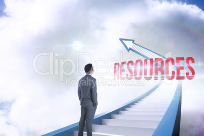 Resources against red staircase arrow pointing up against sky