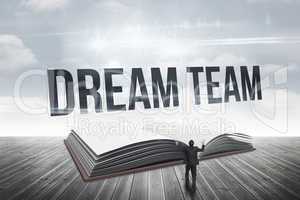 Dream team against open book against sky